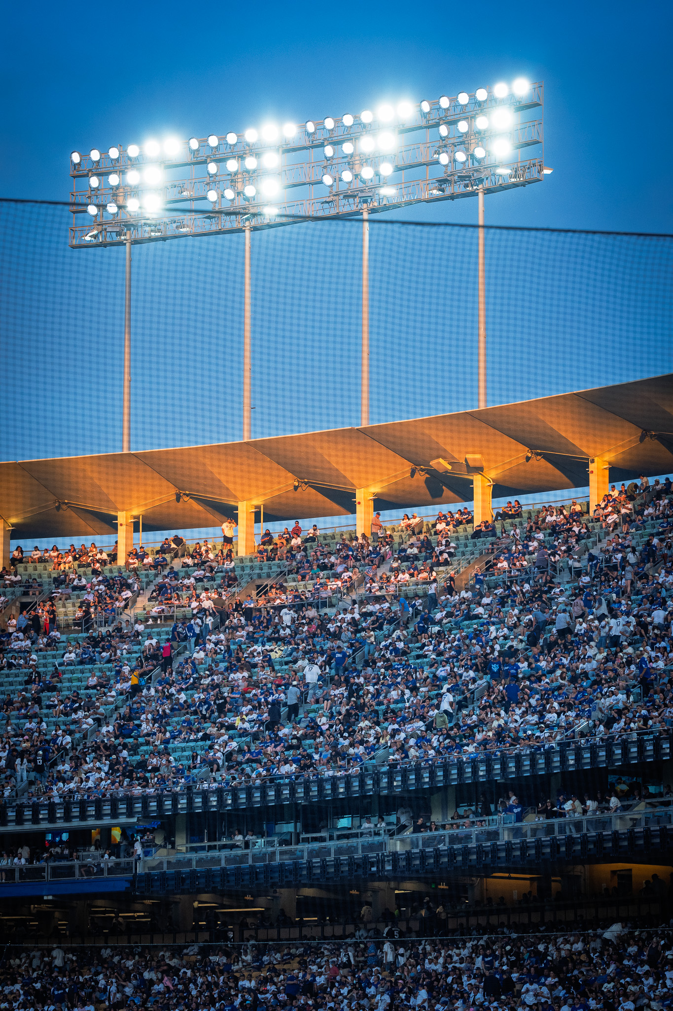 Dodger Stadium under the lights at twilight during the 2026 season
